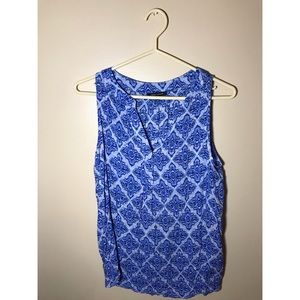 Blue dressy tank top.